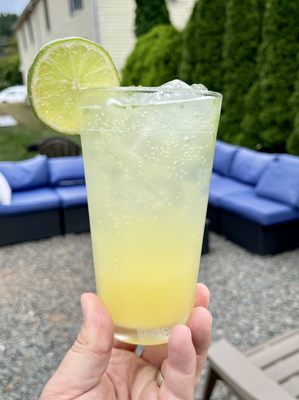 Half Pineapple/Half Seltzer with lime and fresh mint