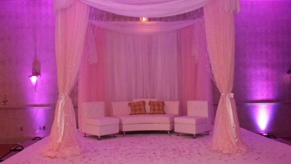 Wedding backdrop with uplighting and Lounge furniture