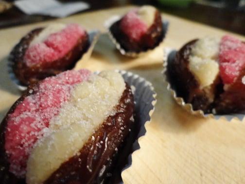 Almond stuffed dates - jumbo Mejdool dates, almonds, sugar, orange blossom water, butter, almond oil, and beet juice for color.