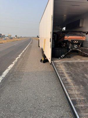 Enclosed trailer traveling through