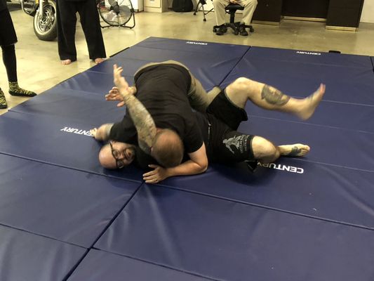 Mr. Kyle demonstrating ground defense techniques at a seminar