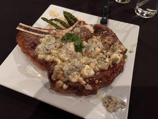 28oz Bone-in Ribeye done Black &blue Style over garlic mashed potatoes