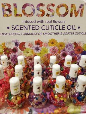 Need a unique gift for a special lady? Scented cuticles oils with real flowers is not only pretty but functional!