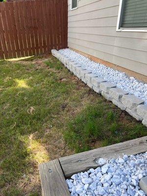 Stone border, fresh landscaping gravel install