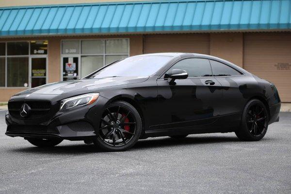 Mercedes-Benz S550 full black wrap, topped with triple black camouflage, chrome delete, calipers paint, window tint and black wheels.