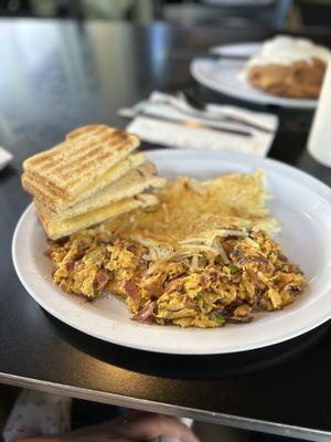 Chorizo scramble with hash brown and toast