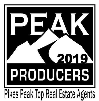 Top Real Estate Agents - Awarded Peak Producer Award