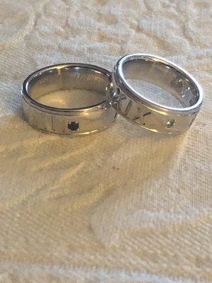 Our wedding bands now with birthstones representing our daughters mother and wedding date.