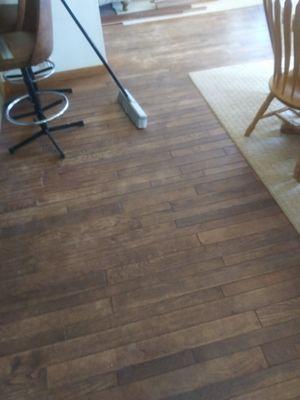 This is part of a vacation house where we removed 1600 Sq. ft. of carpet and old vinyl and replaced it with beautiful hardwood flooring.