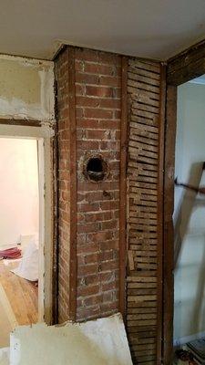 Newly exposed chimney and framing