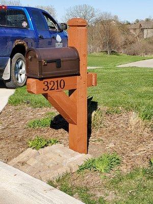 Striped and restrained mailbox with new #s