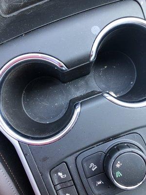 Filthy cup holders after the "wash"