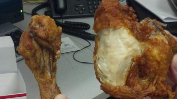 This is the way it was served - Leg looks like it had a bite taken out of it and the breast was missing its skin. Fail.