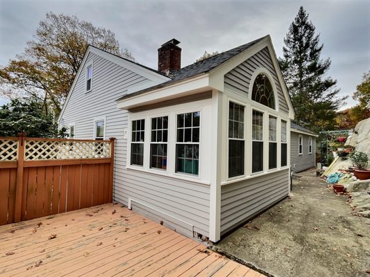 Siding replacement in Lynnfield, MA.  Replaced siding with James Hardie  Plank siding in Pearl Gray.  Trim is PVC.