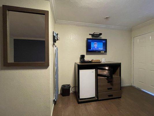 Flatscreen TV, Refrigerator, Microwave, Flat Iron and Ironing board