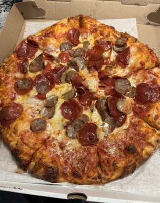 Large pepperoni and sausage pizza