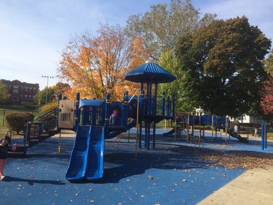 Play area for ages 5-12 (left) and 2-5 (right). Swing set is in the rear.