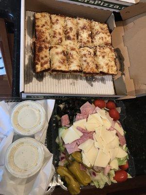 Part of my price match order, small cheese bread and small Antipasto Salad