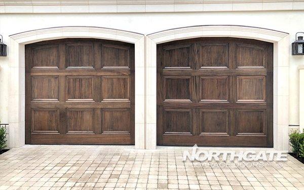 C0082 - Custom butt joint African mahogany face and trim, custom arch top. Photo by Northgate Garage Doors, Inc.™