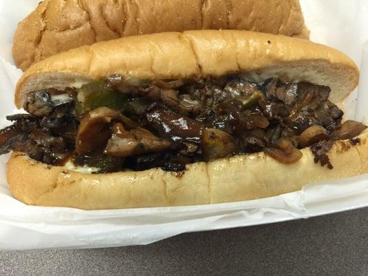 Philly cheesesteak with onions, peppers, mushrooms, provolone cheese light steak sauce and mayo. You HAVE to try it!