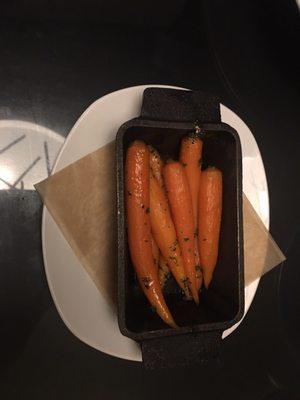 A definite get, honey glazed carrots warmed in a Lodge pan, a light way to start a meal here...