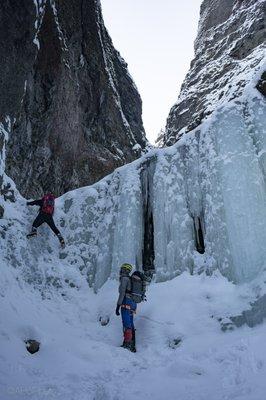 soloing up a small ice section before the first roped pitch