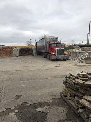 Mulch being delivered by the semi. Black mulch is back!