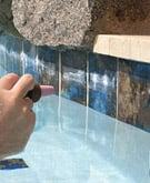 Tile Cleaning - We can make your pool tile look like new again!