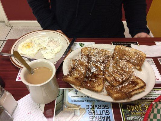 Two eggs over medium and French toast