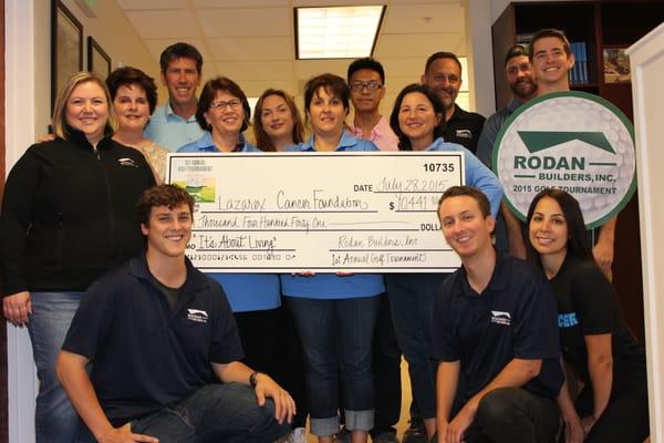 Rodan Builders, Burlingame CA, present Lazarex with $10,441 raised through their May 2015 golf tournament.