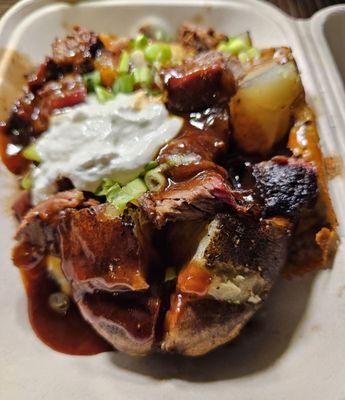 Smoked n' Loaded Baked Potato with brisket.  So cheesy good too!