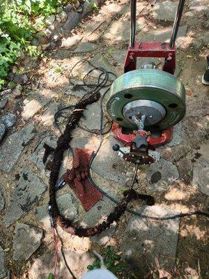 roots removed in the sewer drain with the snake