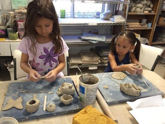 My girls making their various clay projects during a drop in session!:)