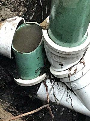 Just outside the foundation the pipe shifted.   Who knew?  Nate fixed it within an hour and cleaned everything up