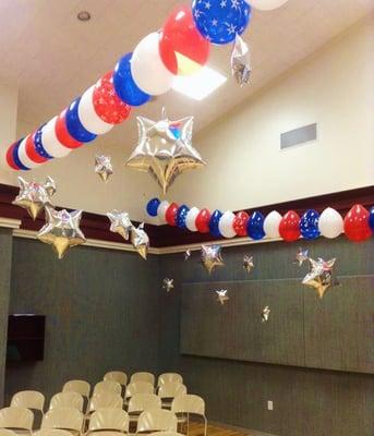 Patriotic string of pearl balloons with dangling silver stars!