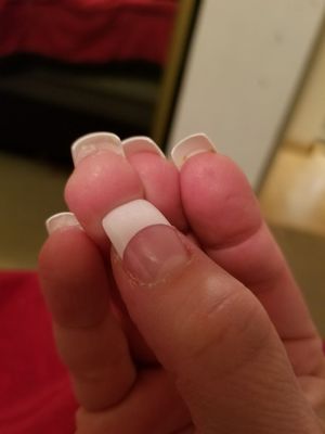 Dead skin around my nails and clumps of acrylic underneath my nails. Just seemed like they did half the job for the full price. I'll pass!