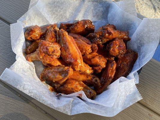 Double Order of Wings in a hot + sweet variety.