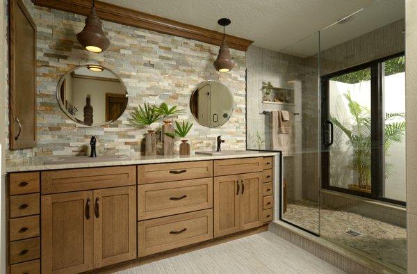 Enlarged bathroom remodel with stacked stone wall