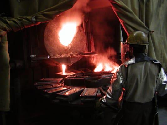 Pouring Gold Bars From Melted Scrap