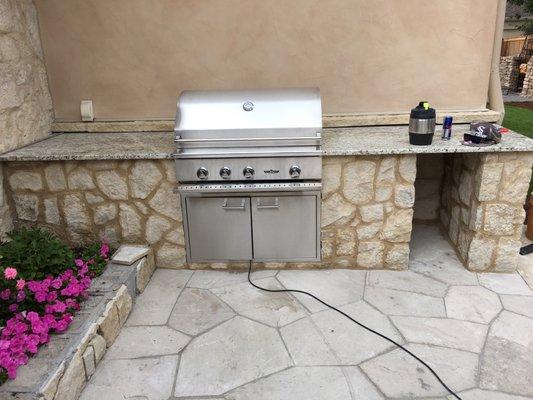 Beautiful simple outdoor kitchen with granite countertop