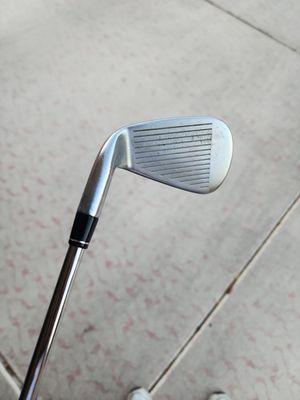 A new shaft on my 7-iron and new grips.