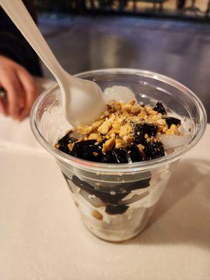 Coconut ice cream with toddy palm, grass jelly, lychee jelly, and peanuts