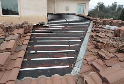 A tile roof being installed.