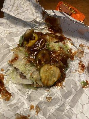 Burger with wrong sauce and absolutely flooded with it