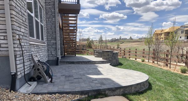 Interlocking paver patio, sitting wall, & fire pit