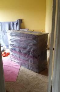 Here we used a customer's furniture pads and shrink wrap to protect their furniture. Rent a truck and we'll load it up.