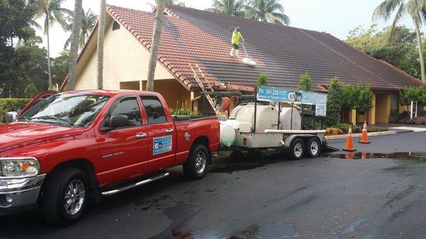 Before and after pressure cleaning this roof with top-notch product