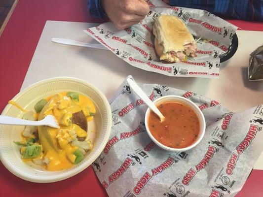 Tomato basil soup, cheddar broccoli cauliflower baked potato and turkey sandwich