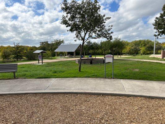 Covered picnic tables and trail