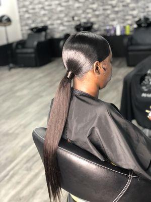 Extended ponytail with middle part